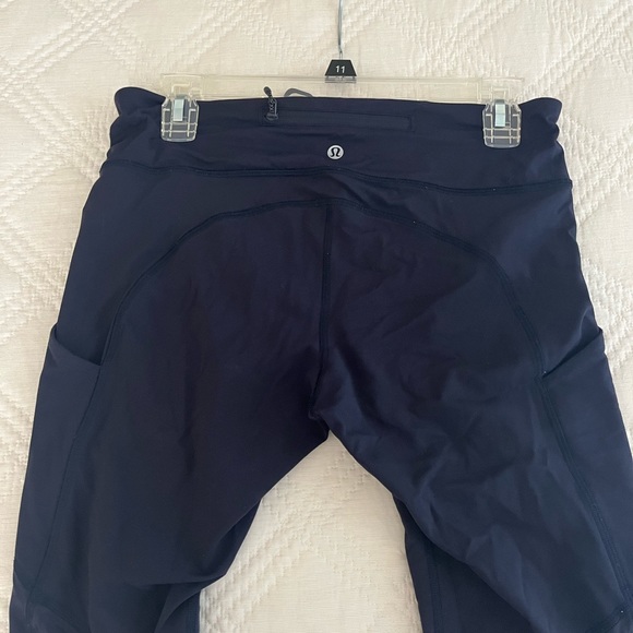 Full length navy blue Lululemon leggings w/ pockets - Picture 2 of 7